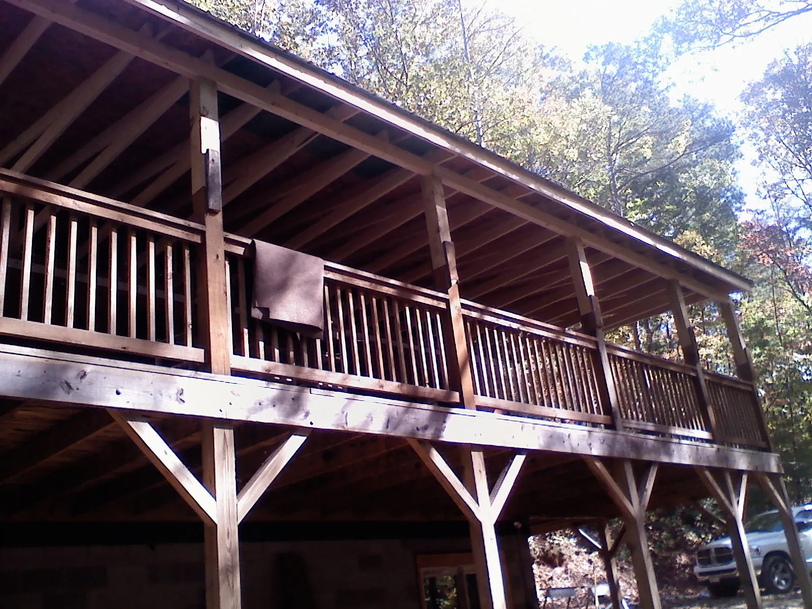 Timber framing under a new elevated porch and deck — Roof Leak Repair in Splendora by Roofing Brothers